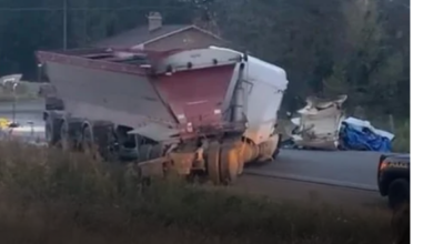 Canada, Two Trucks And A Passenger Car Collide, One Dead