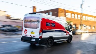 A Canada Post truck leaves a distribution centre in Montreal on Tuesday, Dec.17, 2024. Canada Post is resuming operations after a month-long strike by more than 55,000 postal workers left letters and parcels in limbo.THE CANADIAN PRESS/Christinne Muschi