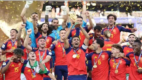 Spain players celebrate after defeating Argentina 1-0 in extra time to win the FIFA World Cup 2026 final at MetLife Stadium.