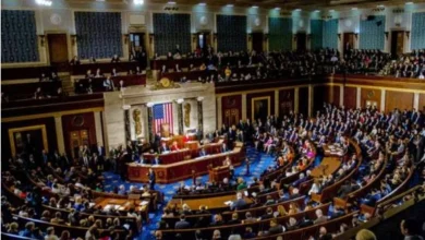 The U.S. Capitol building with the American flag, Pentagon imagery, and military aircraft silhouettes. Avoid dramatic or graphic war imagery.
