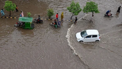Heavy monsoon rainfall flooding streets in Lahore, Pakistan.