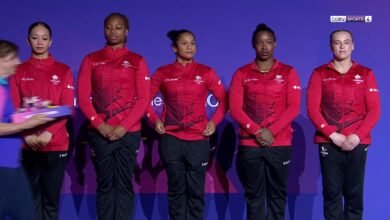 Canada's women's artistic gymnastics team celebrating with silver medals at the Glasgow 2026 Commonwealth Games, featuring Ellie Black and Lia Monica Fontaine after the team final.