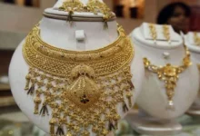 Gold bars and jewelry displayed in a Pakistani jewelry market after gold prices surged to Rs437,936 per tola.