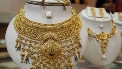 Gold bars and jewelry displayed in a Pakistani jewelry market after gold prices surged to Rs437,936 per tola.