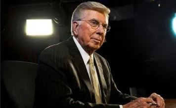 Veteran Canadian news anchor Lloyd Robertson, who passed away at the age of 92 after a distinguished career in broadcast journalism.