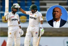 Pakistan cricketers Babar Azam and Abdullah Shafique batting together during a Test match against the West Indies.