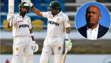 Pakistan cricketers Babar Azam and Abdullah Shafique batting together during a Test match against the West Indies.