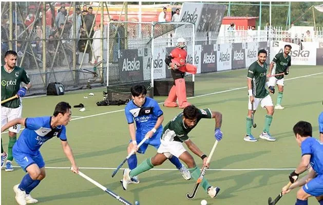 Pakistan hockey players celebrating after defeating South Korea in the third Test match to seal the series.