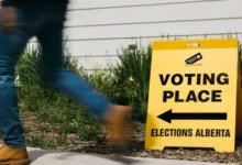 Elections Alberta sign and voting information ahead of the October 19, 2026 referendum