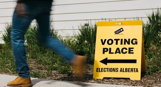 Elections Alberta sign and voting information ahead of the October 19, 2026 referendum