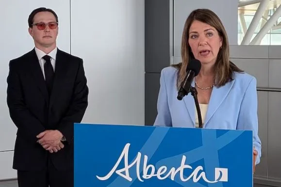 Text: Alberta Premier Danielle Smith and the proposed high-speed rail project connecting Calgary, Red Deer and Edmonton