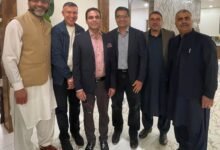 Qasim Ali Shah addressing the Pakistani community at an Al Mustafa Welfare Alberta event in Calgary