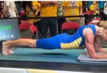 Donna Jean Wilde, a 61-year-old Alberta grandmother, celebrates her five-hour plank world record attempt.