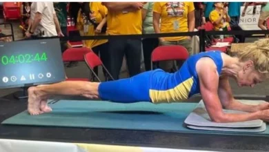 Donna Jean Wilde, a 61-year-old Alberta grandmother, celebrates her five-hour plank world record attempt.
