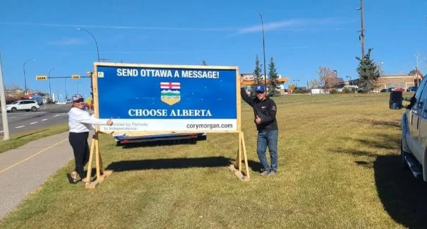 Controversy in Calgary over the removal of posters supporting an Alberta separation referendum.
