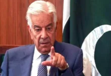 Pakistan Defence Minister Khawaja Asif amid controversy over overseas YouTubers supporting PTI.