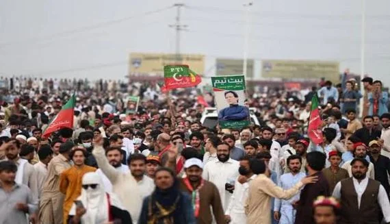 PTI long march participants travelling through Charsadda under the leadership of Khyber Pakhtunkhwa Chief Minister Sohail Afridi