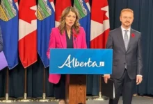 Alberta Premier Danielle Smith speaking at an official ceremony as the province proposes changes to DEI hiring policies