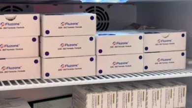 Boxes of flu vaccines displayed on pharmacy shelves ahead of Alberta’s seasonal flu vaccination campaign.