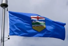 Alberta provincial flag as voters await referendum results on separation from Canada and provincial powers.