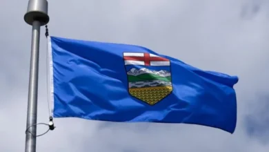 Alberta provincial flag as voters await referendum results on separation from Canada and provincial powers.