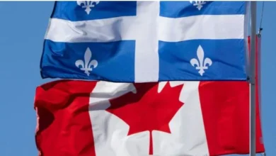 Canadian and Quebec flags illustrating the renewed debate over Quebec separation and independence