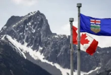 Flags of Alberta and Canada displayed together amid debate over Alberta’s future and possible separation from Canada.