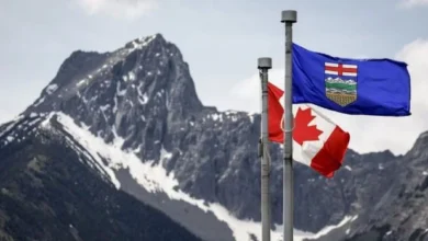 Flags of Alberta and Canada displayed together amid debate over Alberta’s future and possible separation from Canada.