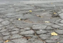 A large pothole on a Montreal street highlights deteriorating road conditions and ongoing maintenance challenges ahead of winter.