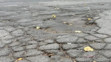A large pothole on a Montreal street highlights deteriorating road conditions and ongoing maintenance challenges ahead of winter.