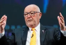 US Ambassador speaking at an event amid diplomatic tensions over allegations of Canadian interference in American elections.